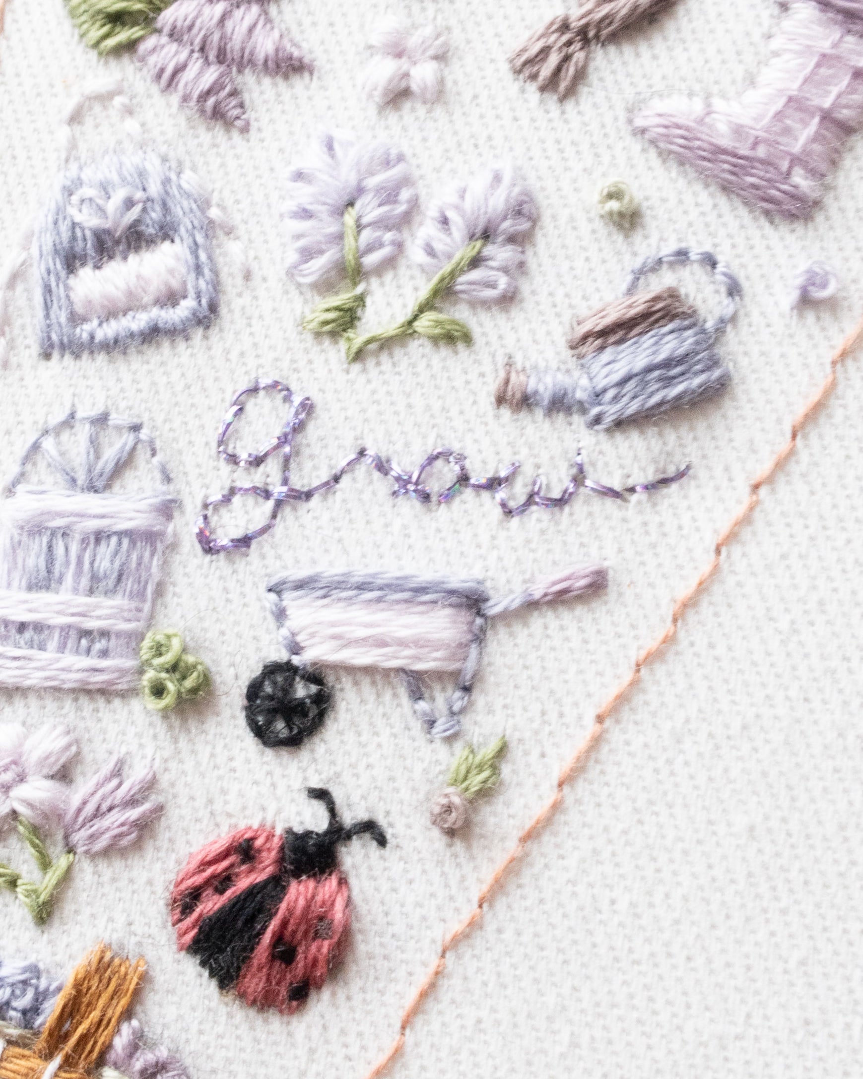 Embroidery Journal - Add On Icons, Words close up stitched example