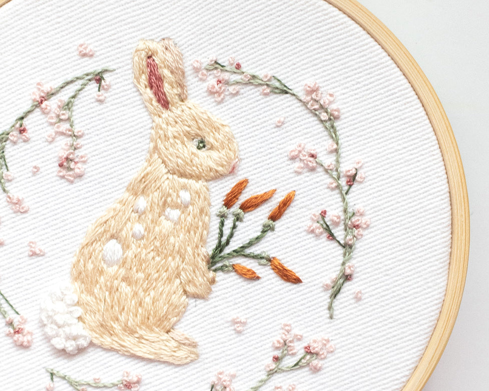 Spring Bunny Embroidery Pattern close up finished piece with bunny and carrots