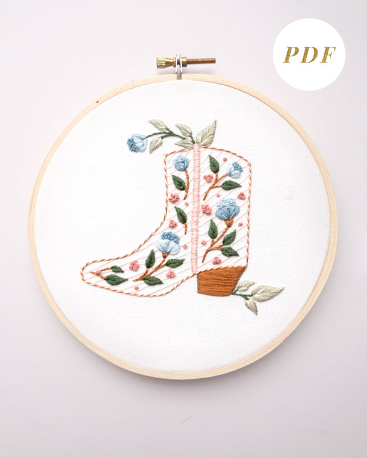 Floral cowboy boot hand embroidery pattern with pink and blue flowers and light green leaves