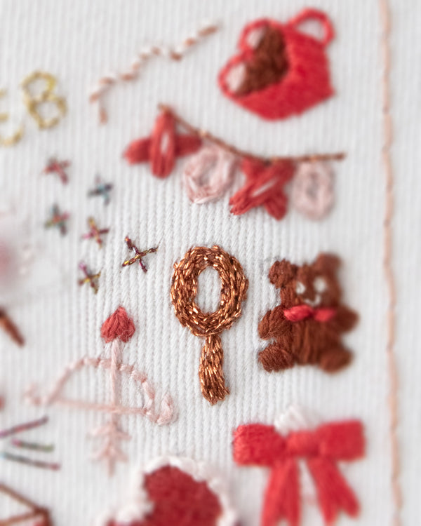 Embroidery Journal - Add On Icons, Basic Shapes close up detail of red shapes showing stitching used
