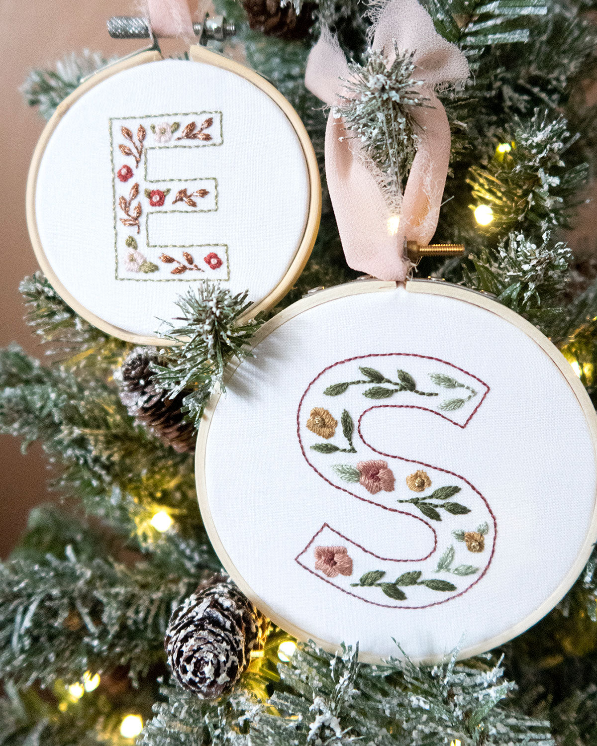 Floral Alphabet Embroidery Digital Pattern stitched as ornaments on a tree