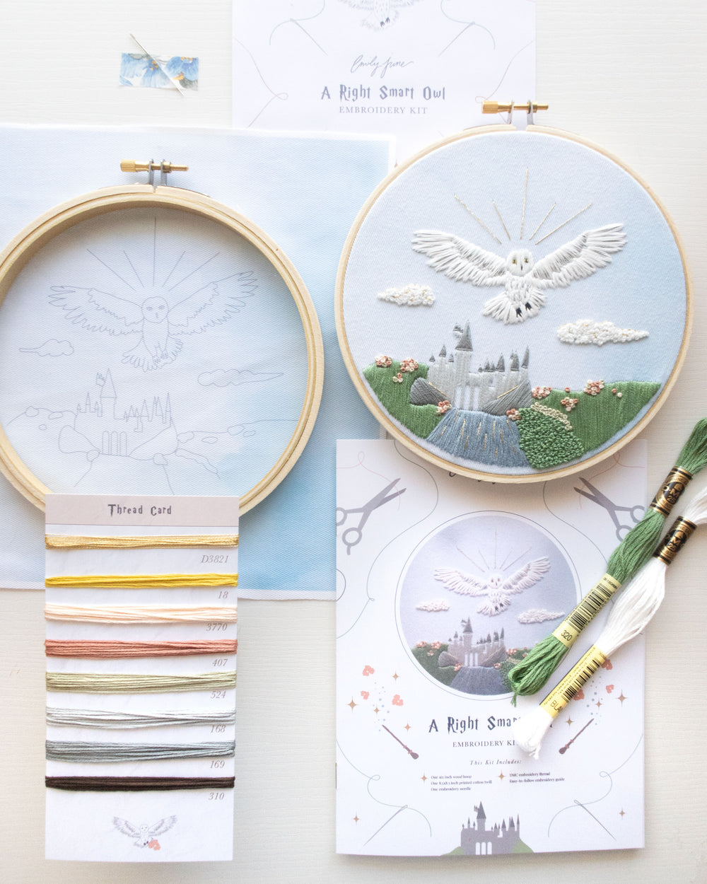 Spring Magical Owl Embroidery Kit on a book with flowers and floral scissors