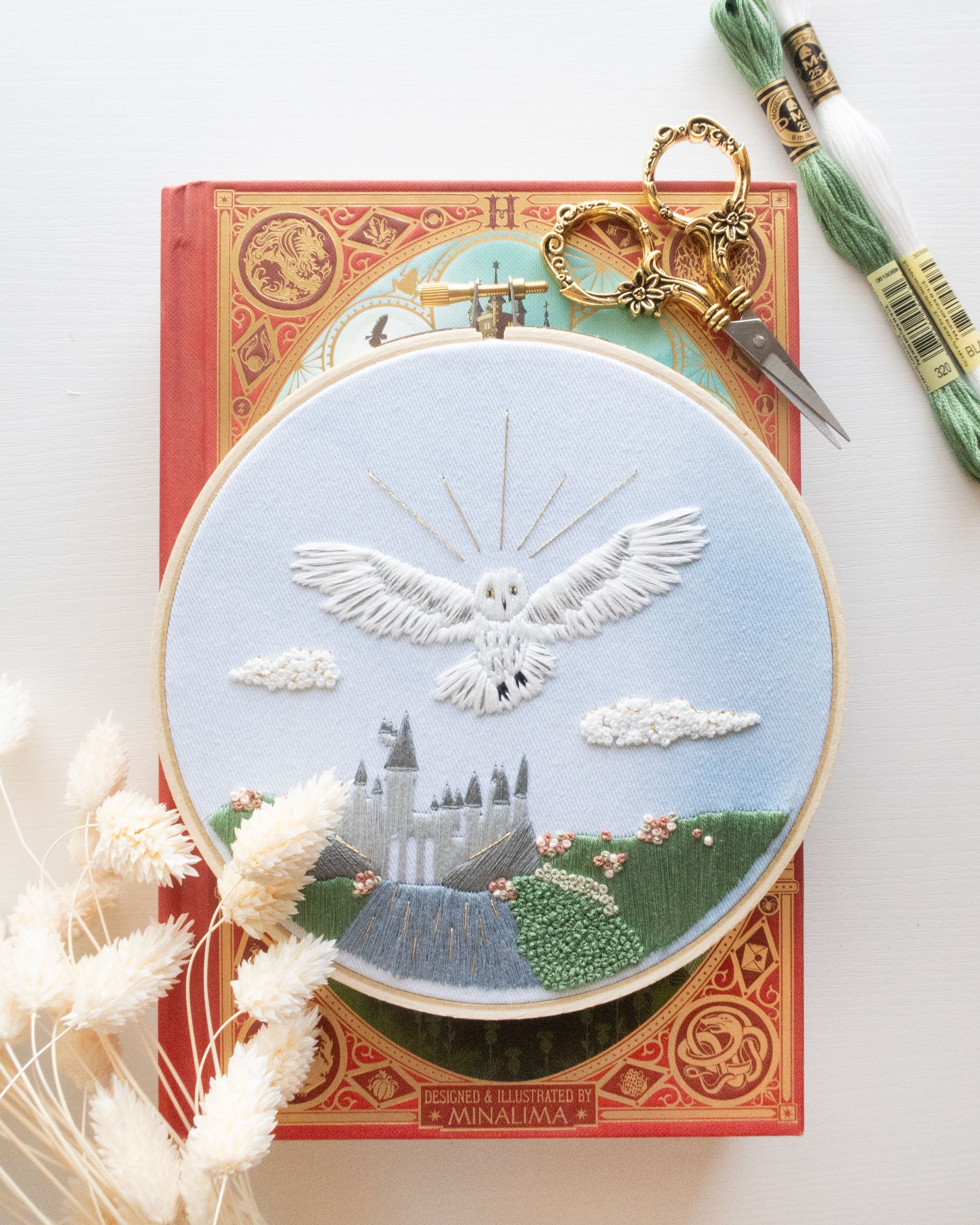 Spring Magical Owl Embroidery Pattern on a book with floral scissors