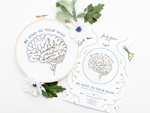 Be Kind To Your Mind Floral Brain Embroidery Kit finished with instruction booklet with flowers