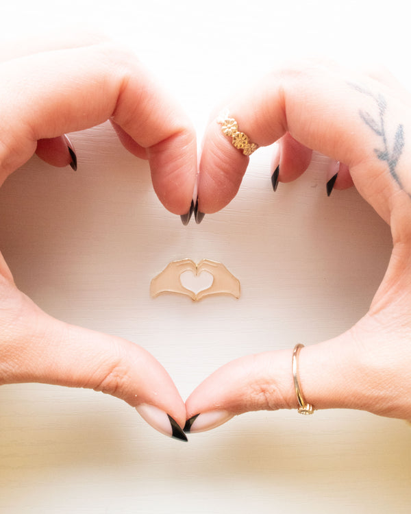 Heart Hands Embroidery Needle Minder framed by real heart hands
