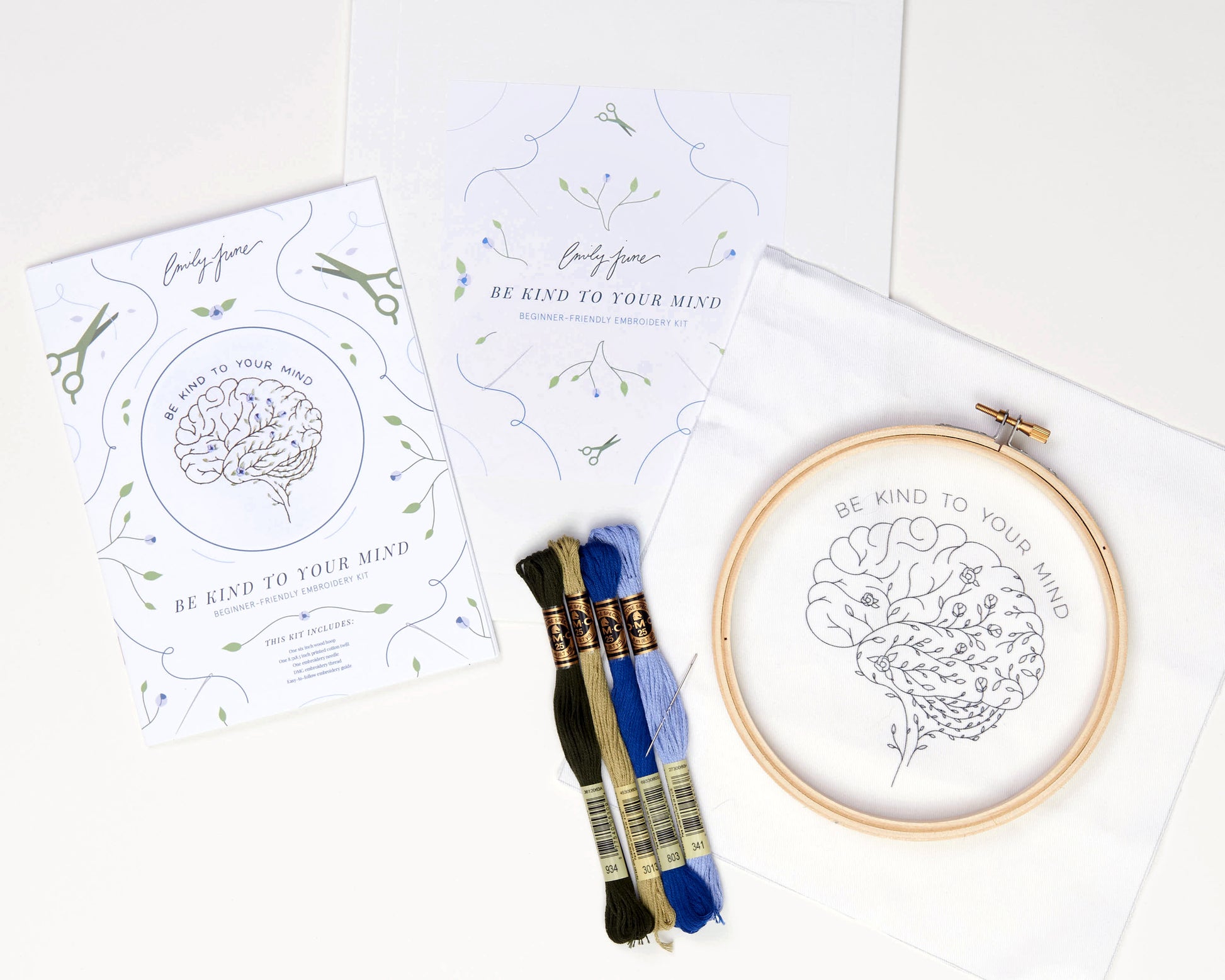 Be Kind To Your Mind Floral Brain Embroidery Kit contents spread out on a white background