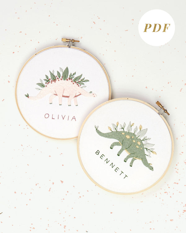 Green and pink dinosaur embroidery with leaves and flowers and custom baby name embroidery pattern