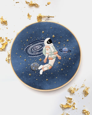 Blush astronaut in outer space hand embroidery kit for outer space nursery or decor with planets and stars