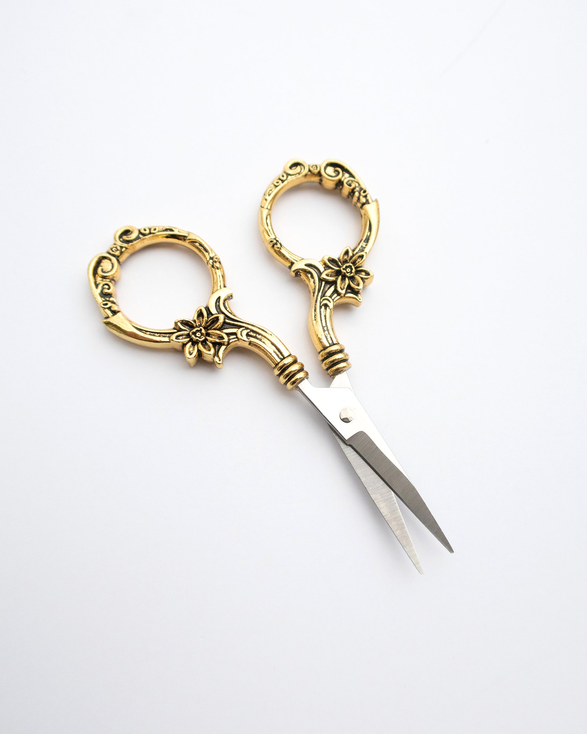 Small vintage gold sewing scissors or embroidery scissors