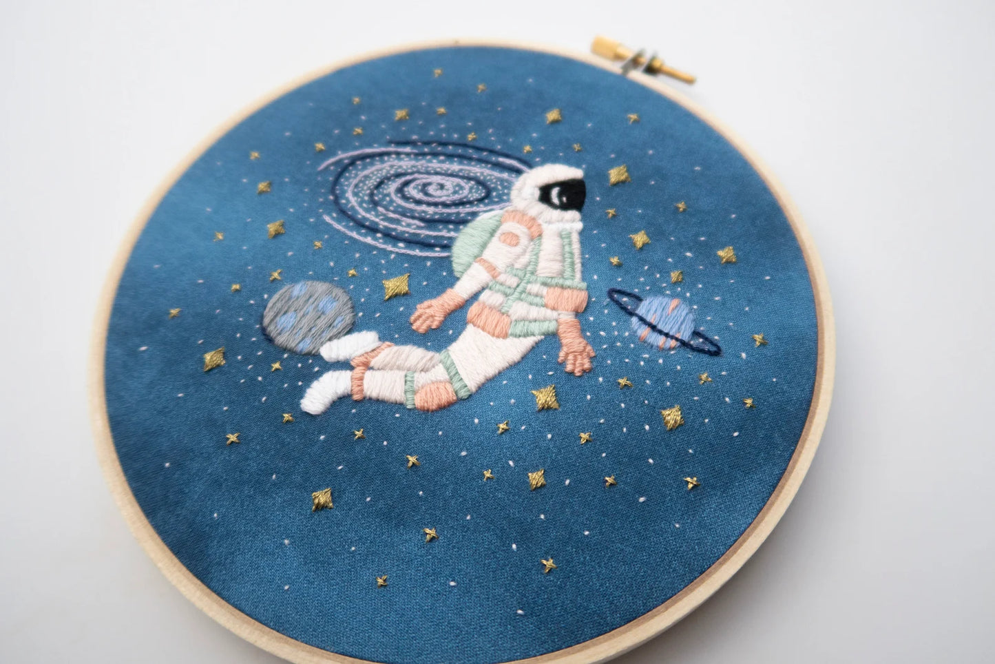 Blush astronaut in outer space hand embroidery kit for outer space nursery or decor with planets and stars