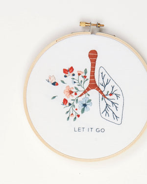 Let it go floral lung hand embroidery kit with pink and blue flowers and butterflies for mental health craft