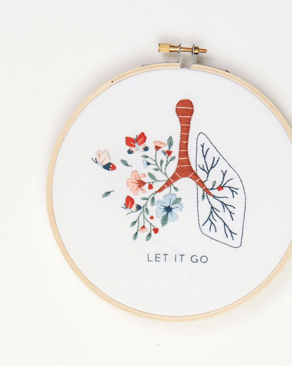 Let it go floral lung hand embroidery kit with pink and blue flowers and butterflies for mental health craft